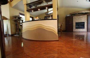 Residential Metallic Floor with a rich, glossy copper finish in a stylish living space featuring modern architecture and custom curved wall accents.